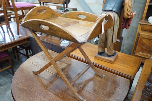A reproduction George III style mahogany butler's tray on folding stand, width 87cm, depth 64cm, height 55cm